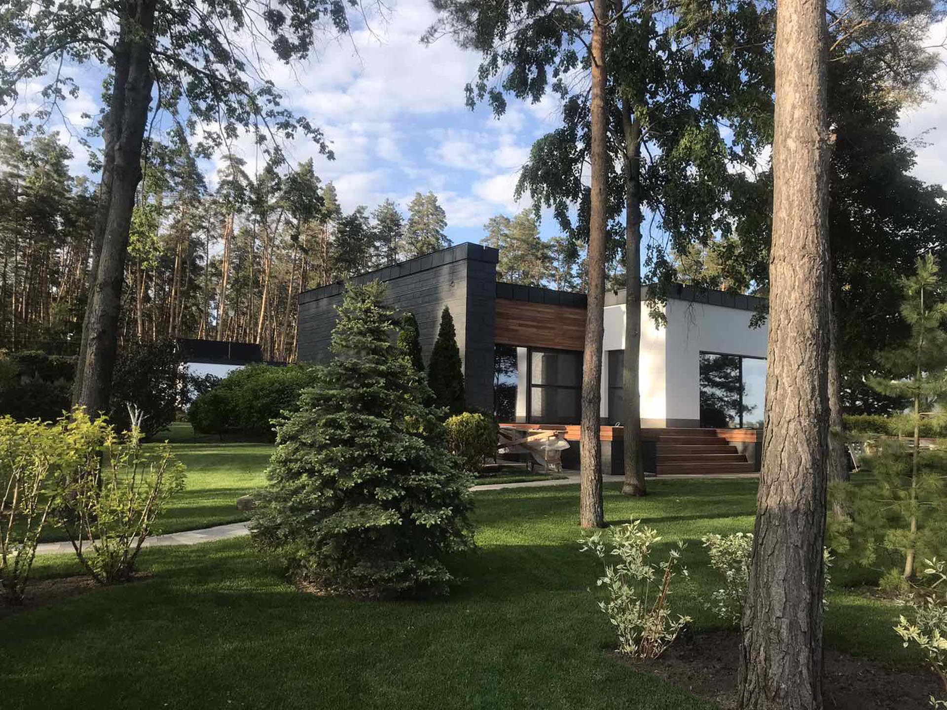 Дом на берегу. Фасадный сланец Samaca